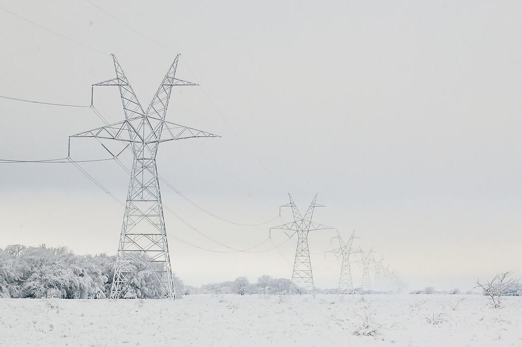 Transmission towers and power lines in snow in East Texas